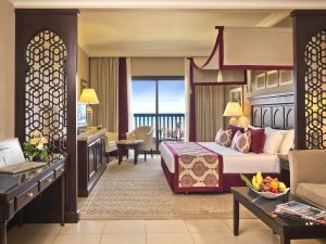 Miramar Al Aqah Hotel Room Bed